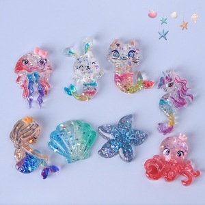 Nouveaux charms transparents en acrylique à paillettes, en forme de coquillage et d'étoile de mer, style sirène, pour DIY <span class=keywords><strong>Havaianas</strong></span>, avec possibilité d'ajouter des crochets - Product Image 1