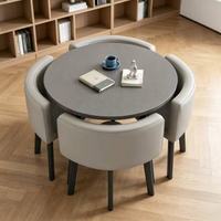 Ensemble de table à manger moderne en MDF avec plateau rond et 4 chaises rembourrées pour la salle à manger à domicile