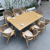 Ensemble de table et chaises en teck massif pour l'extérieur, style moderne et luxueux, avec chaise en corde et teck