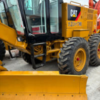 Niveleuse à moteur CAT 140H d'occasion en bon état, matériel de construction pour le nivellement des routes