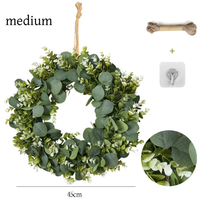 Vente en gros de couronnes de fleurs artificielles décoratives pour plantes, printemps et été, couronne verte d'eucalyptus pour porte d'entrée, décoration de Noël