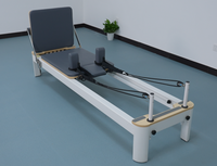 Appareil de Pilates Reformer en aluminium massif blanc pour usage commercial en studio de fitness