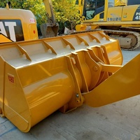 Chargeur sur pneus CAT 966H 6 tonnes d'occasion aux États-Unis en bon état