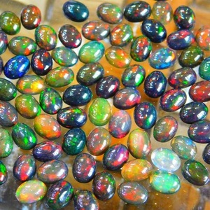 พลอยโอปอลจากเอธิโอเปียนสีดำอัญมณีสีฟ้าเจียระไนทรงไข่ทรงหลังเบี้ยทรงหลวมสีตัดทรงรี-เปลี่ยนการรักษาความร้อนที่ไม่เหมือนใคร - Product Image 6