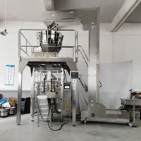 Máquina de Envasado Automática Vertical Multifuncional al por Mayor para Bolsas y Productos envasados en Film como Snacks, Pizza, Donuts y Alimentos Congelados