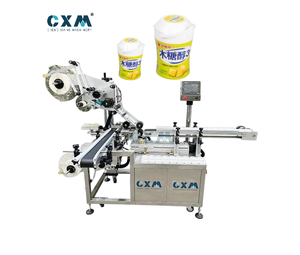 Machine d'étiquetage adhésive pour le dessus et le dessous des bocaux ronds CX-SXT pour les produits alimentaires, cosmétiques et quotidiens - Product Image 1