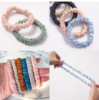 Vente en gros de chouchous en soie de mûrier 100% de grade 6A, design simple et luxueux de couleur unie, de petite taille, haute qualité, avec étiquette personnalisée et étiquette volante