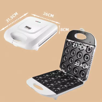 Vente directe d'usine trou beignet anneau multi-fonctionnel friture Mini Snack Machine automatique beignet fabricant beignet Machine