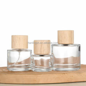 Venta caliente 30ml 50ml 100mL Perfume redondo Engarzado <span class=keywords><strong>en</strong></span> botella de vidrio con bomba tapa de madera para Perfume loción Perfume botella de vidrio - Product Image 5