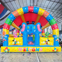 Château gonflable Thuy Linh en forme d'éléphant bleu, 5m x 10m, en PVC, facile à installer, pour applications de jeux et parcs d'attractions, garantie 12 mois