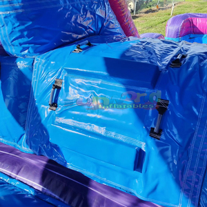 Château gonflable commercial pour enfants, thème palais violet, avec toboggan aquatique et zone de saut. - Product Image 6