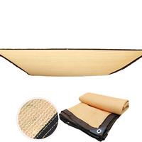 Voile d'ombrage robuste beige en HDPE pour balcon et terrasse extérieure, avec bord renforcé manuel et œillets en aluminium