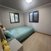 Serre de transport en acier préfabriquée, pliable et extensible, de 20 et 40 pieds, prête à l'emploi, moderne, étanche, pour usage résidentiel, chambre, hôtel