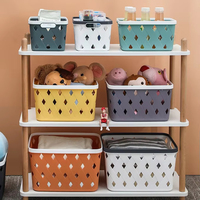 Panier de rangement en plastique creux de forme rectangulaire avec poignée Panier organisateur multifonction familial