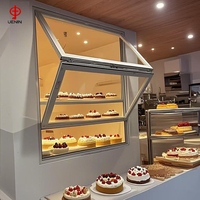 NFRC Double panneau de verre pliable cadre en aluminium pliable Windows Cafe Coffee Shop motif d'ouverture verticale pour la cuisine utilisation en extérieur