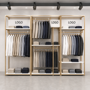 ชั้นวางโชว์เสื้อผ้าสแตนเลสสีทองพร้อมโลโก้สั่งทำพิเศษ สำหรับร้านเสื้อผ้าบุรุษ สตรี และเด็ก ดีไซน์หรูหราสำหรับร้านค้า - Product Image 5