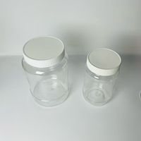 Bouteille en PET transparente cylindrique, bouteille en plastique carrée ou ronde pour l'emballage du miel avec couvercle noir