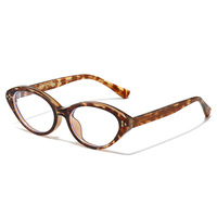 Lunettes 2026 Vintage haut de gamme anti-lumière bleue, monture ovale orange unie en acétate TR, à motif léopard, avec rivets et articulation à broche, monture intégrale