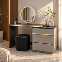 Table de toilette pour le maquillage avec miroir rond orné de pierres, panneau en verre noir, tiroirs à bordure dorée pour chambre à coucher, maison et salon de beauté