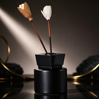 Diffuseur d'arômes en verre rond noir mat de 100 ml pour l'aromathérapie avec couvercle