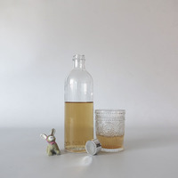 Bouteille en verre scellée cylindrique avec couvercle en aluminium argenté Bouteille en verre de 700ml