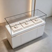 Vitrine de présentation de bijoux sur mesure pour grandes boutiques de centres commerciaux, avec éclairage LED, en bois peint et verre, noir et or, pour affichage commercial