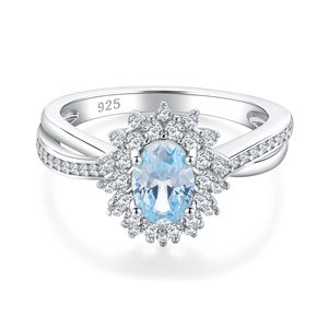 Anillo de aguamarina sintética de 1.1 quilates, plata de ley 925 maciza, corte ovalado, halo de circonita cúbica 5A, anillo de compromiso y boda, joyería de piedras preciosas para mujer - Product Image 1