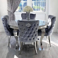 Table à manger ronde de luxe au design moderne et élégant pour 4 personnes, avec plateau en marbre et pieds en acier inoxydable, idéale pour appartement ou hôtel