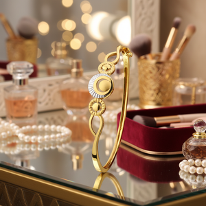 Stylish circular motif <b>gold</b> bangle design for women with dual tone detailing modern lightweight jewellery elegant daily wear - Product Image 2