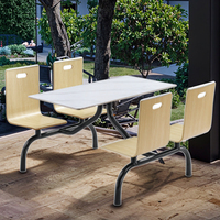 Moderne Restaurantmöbel Esstisch und 4 Stühle Set mit Marmorplatte Metallrahmen Wasserdicht & Langlebig