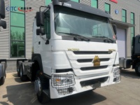 Produsen Profesional Truk Traktor HOWO 6X4 Bekas yang Direkondisi RHD 90 Fifth Wheel Sistem Rem yang Diperbarui untuk Pengiriman Jarak Jauh ke Kenya.