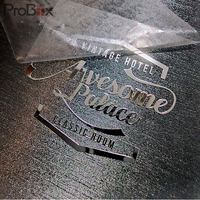 Étiquettes imperméables en nickel clair petit gaufrage en plastique logo de marque en métal autocollant pour bouteille d'huile de vernis à ongles
