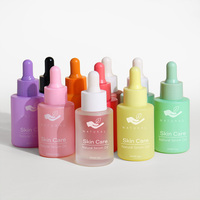 Flacon compte-gouttes en verre personnalisé rose de luxe de 30ml boîte de conteneur de dose de goutte oculaire cosmétique vide pour le sérum et l'huile essentielle de soins de la peau