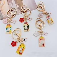 Porte-clés personnalisé OEM ODM, pendentif émaillé Lapin Porte-Bonheur Fleur de Cerisier, amulette Fortune, Richesse, Santé