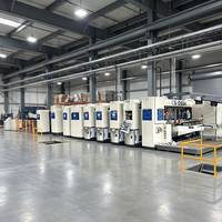 Machine de production intégrée entièrement automatique haute vitesse pour l'impression, le rainurage, la découpe, le pliage et la collage du carton ondulé