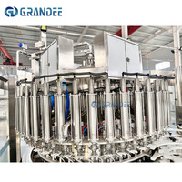 Machine de remplissage et d'embouteillage rotative monobloc entièrement automatique à grande vitesse 15000 BPH pour alcool et vin, à vendre