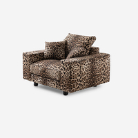 Fauteuil de salon design minimaliste fait main avec imprimé léopard, structure en bois massif et mousse haute résilience pour chambre à coucher et salon