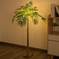 Feuilles de faux palmier tropicales réalistes grands cocotiers incurvés artificiels à vendre pour le centre commercial d'hôtel