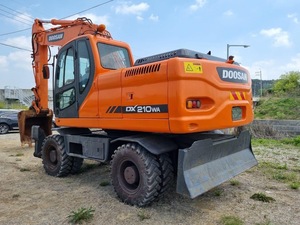รถขุดล้อยาง Doosan DX210WA มือสอง ปี 2025 น้ำหนัก 20.8 ตัน เครื่องยนต์และเกียร์แท้จากเกาหลี ขาย - Product Image 1