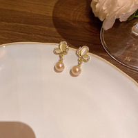 Boucles d'oreilles pendantes RINHOO tendance, ailes de papillon, imitation perle champagne, strass exquis, bijoux mignons pour soirée