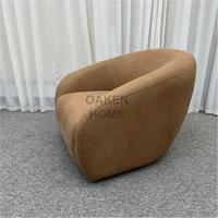 Fauteuil d'appoint en cuir OAKEN moderne, incurvé et pivotant, fauteuil barillet rembourré, canapé de salon individuel pour la détente