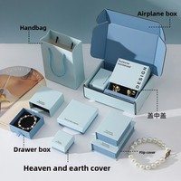 Boîte de rangement bleue pour bijoux avec couvercle, doublure en éponge, tiroir à empreintes pour emballage de boucles d'oreilles et colliers