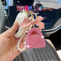 Breloque de sac de style créateur, petite pochette parfumée, autocollant style Ins, cordon à diamants, porte-clés de sac à main avec diamants simulés, design de niche