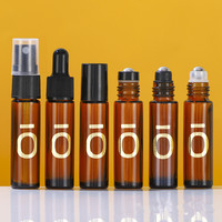 Bouteille d'huile essentielle personnalisée vide de couleur ambre 10ml avec bouchon en Grain de bois