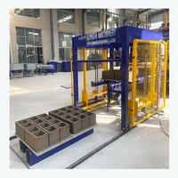 Chaîne de production complète et entièrement automatique de machines à fabriquer des briques creuses en ciment QT6-15, des pavés et des blocs de béton solides pour usine