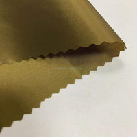 20D 400T fil noir trilobé Nylon taffetas deux tons brillant métallique Nylon taffetas tissu avec Cire et WR pour vestes anti-duvet