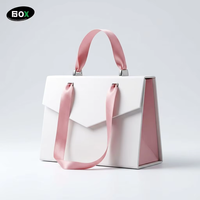 Boîte pliante magnétique de luxe FUSSEN avec logo personnalisé, étanche, finition mate et ruban gaufré, style sac à main, pour coffret de soins de la peau