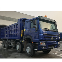Самосвал Howo 8x4 с малым пробегом, б/у, для перевозки песка и камня, надежный, для строительных проектов.