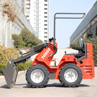 Mini chargeuse sur pneus à direction par glissement directe d'usine avec moteur diesel Kubota de 25 ch, débit hydraulique élevé, mini chargeuse sur pneus puissante 4x4