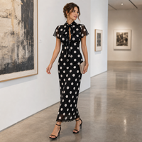 Robe longue noire à pois avec nœud et bordure en dentelle pour la vente en gros